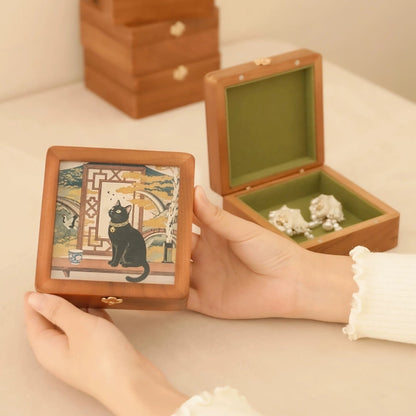 Cherry wood jewelry box by Merrin with artistic glass lid