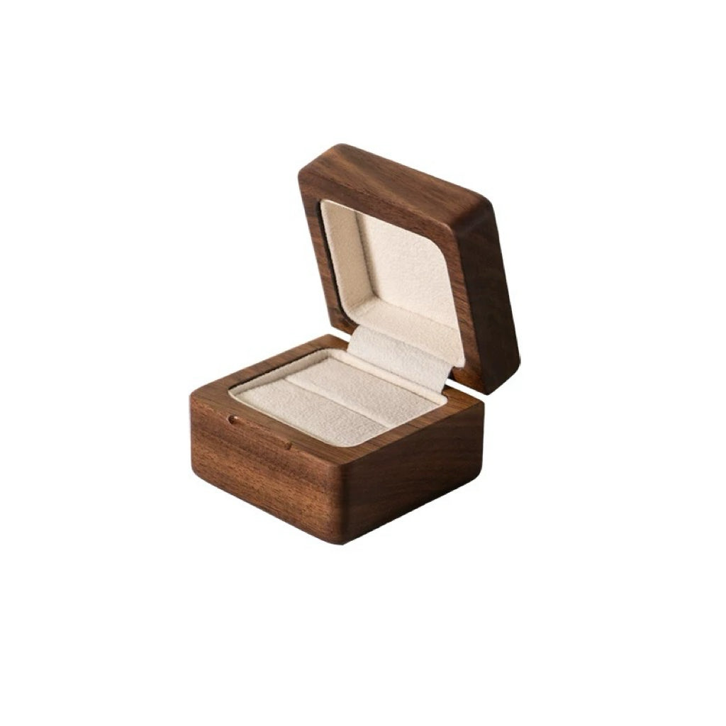 Elegant wooden ring box with minimalist design