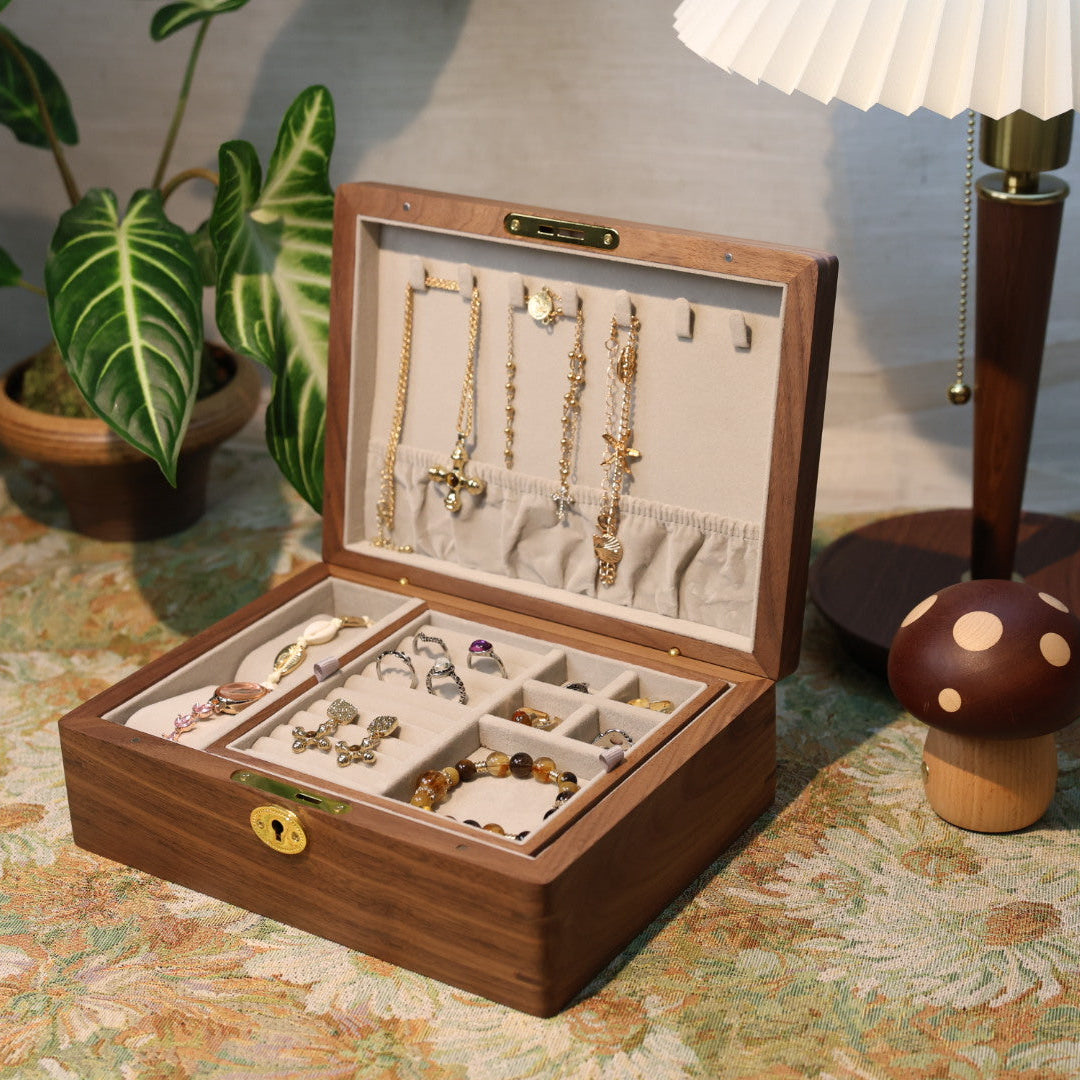 Wooden jewelry box with jewelry on a decorative table