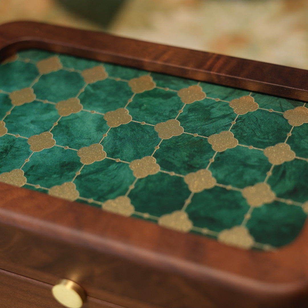 Wooden box with green and gold patterned lid