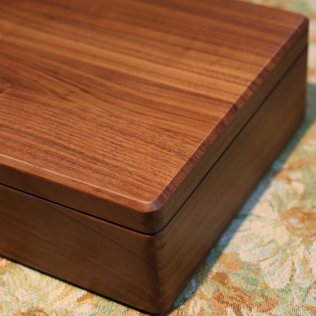 Wooden box with a floral-patterned surface
