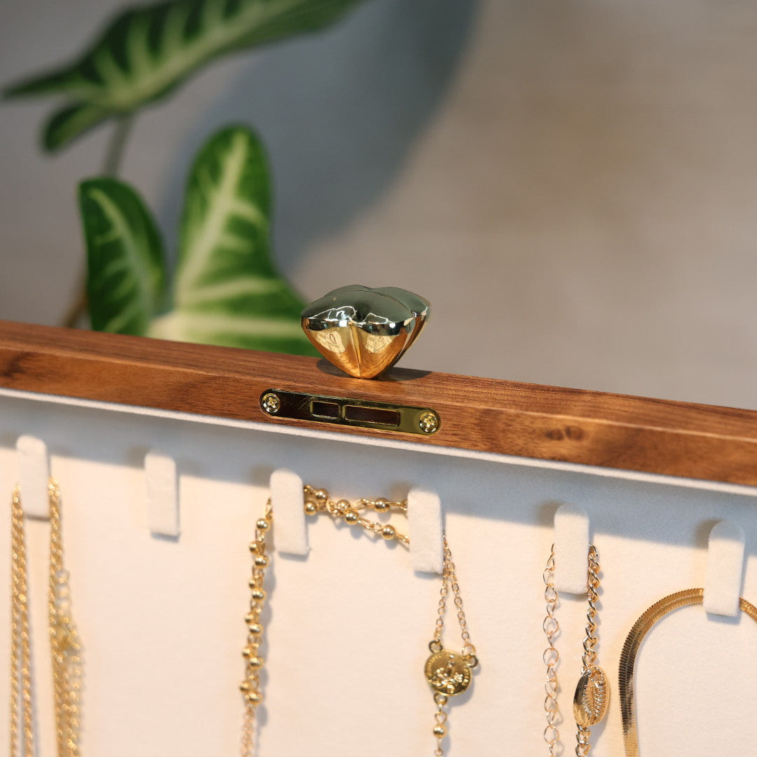 Jewelry organizer with necklaces on a white background