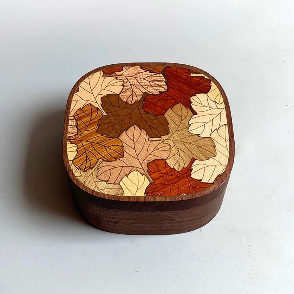 Inlaya Handmade Walnut Retro Print Jewelry Box on wooden table