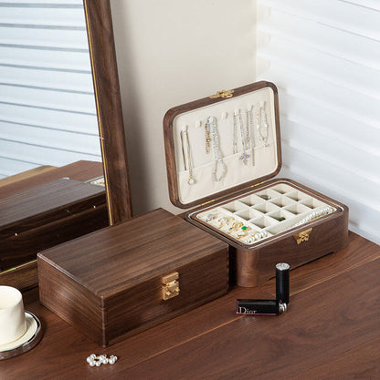 Lunaria Retro Black Walnut Jewelry Box holding earrings