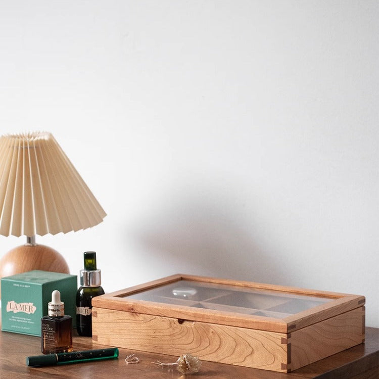 Solid wood jewelry box with glass lid open showing compartments