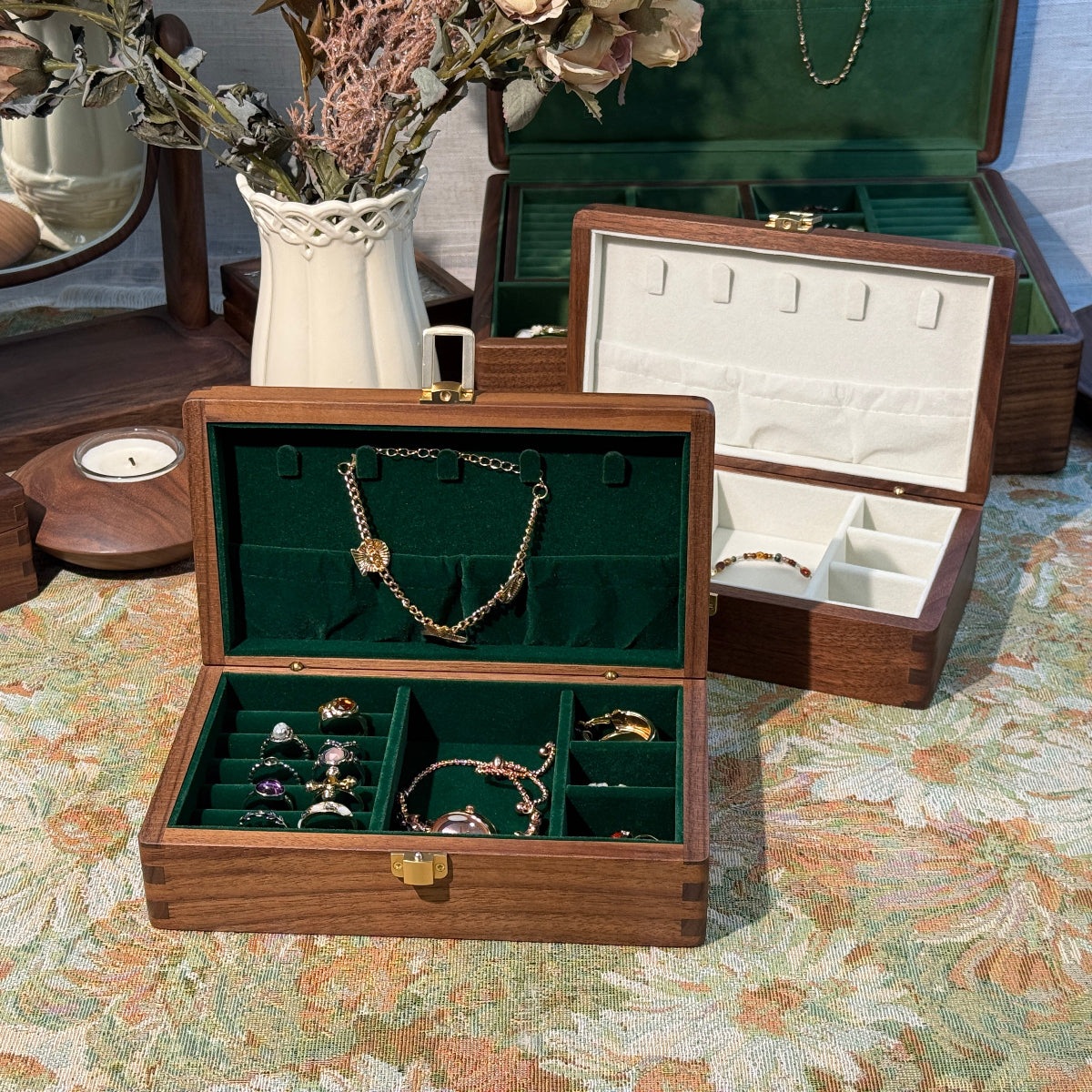 Wooden jewelry box with jewelry on a patterned surface